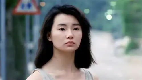 张曼玉这个忧伤的表情,黯然神伤,我用来做手机壁纸
