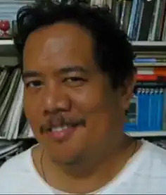 求一个大叔阴险的笑表情

